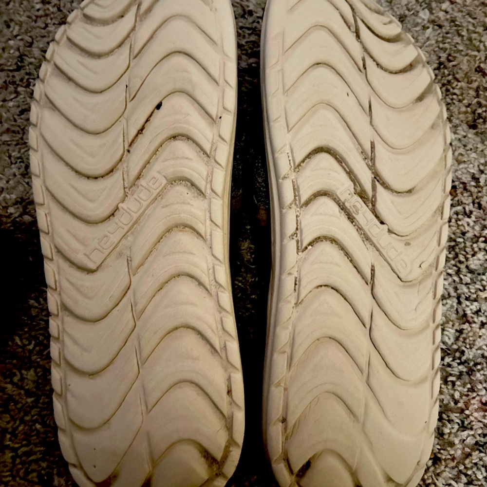 Size 12 Hey Dude flip flops 
Brown/tan in color